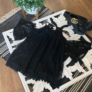 Black lace off shoulder shirt from iZ BYER. Size medium.